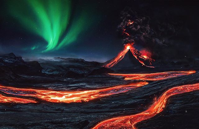A dramatic landscape featuring an erupting volcano and the aurora borealis in the night sky with flowing lava.