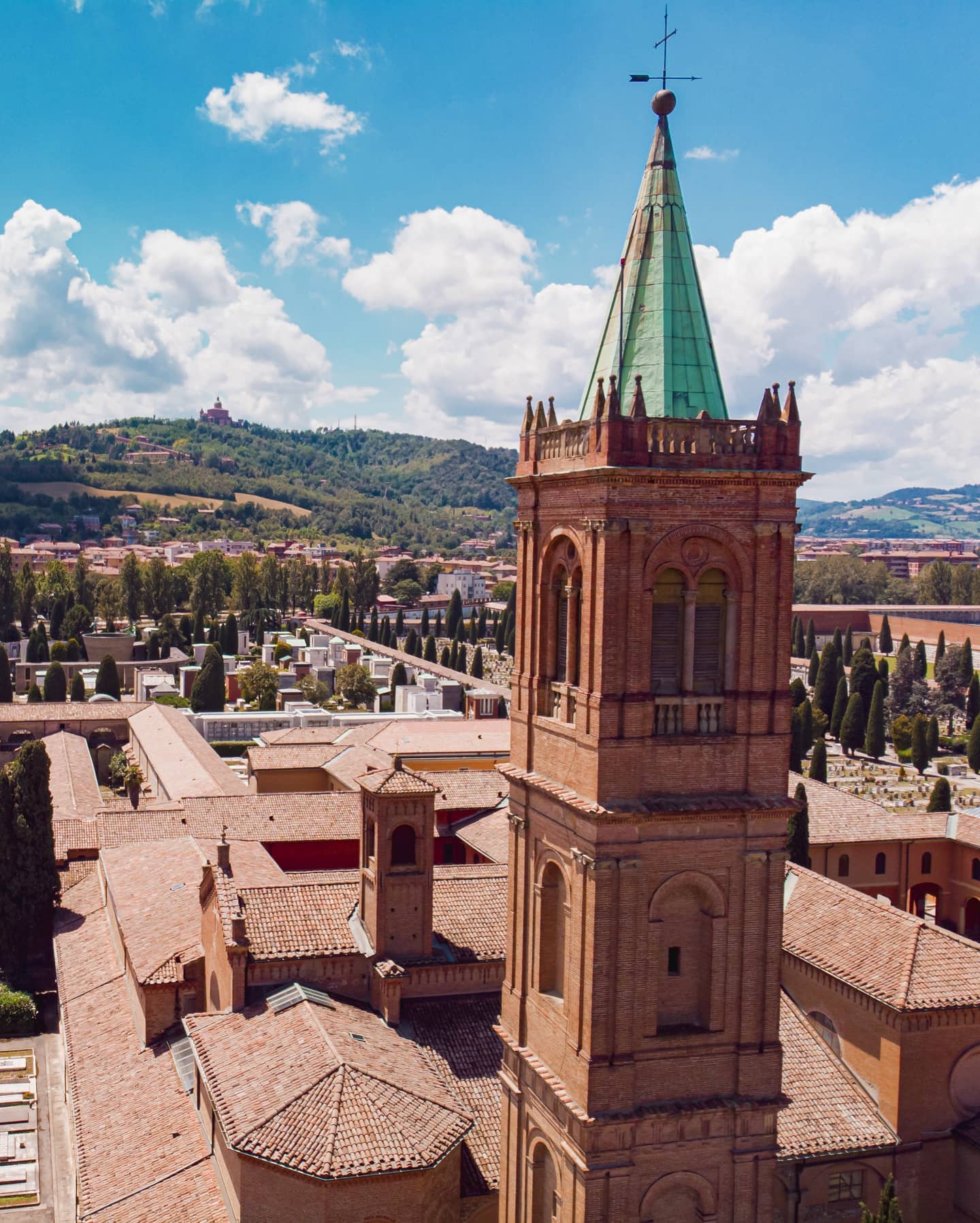 Aerial view of the Certosa di Bologna cemetery and its historic architecture on a sunny day.