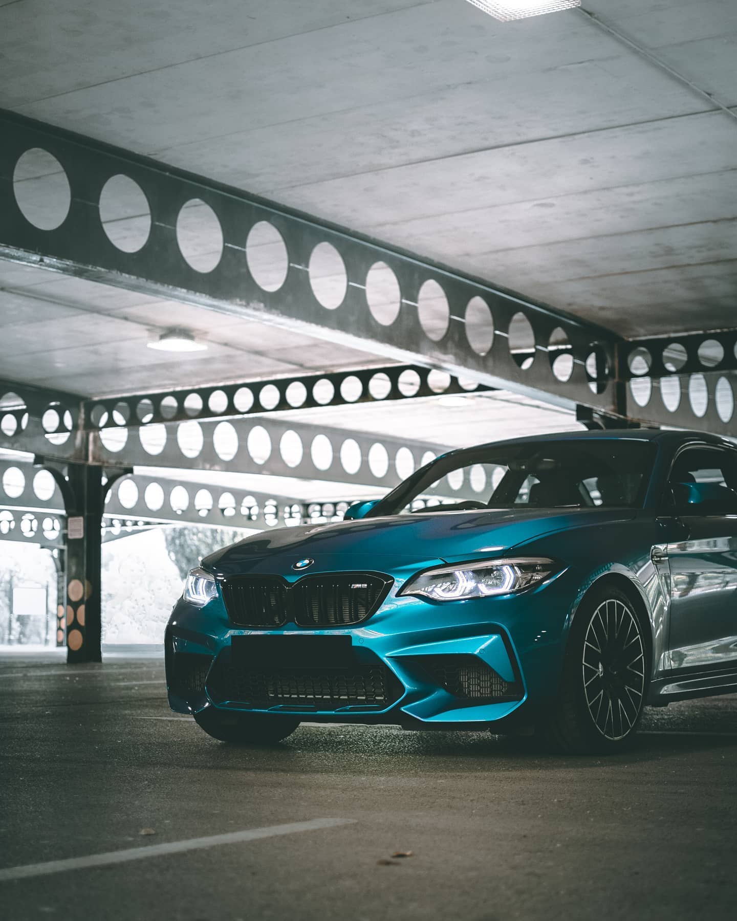 Teal Bmw M2 Indoor Parking Garage