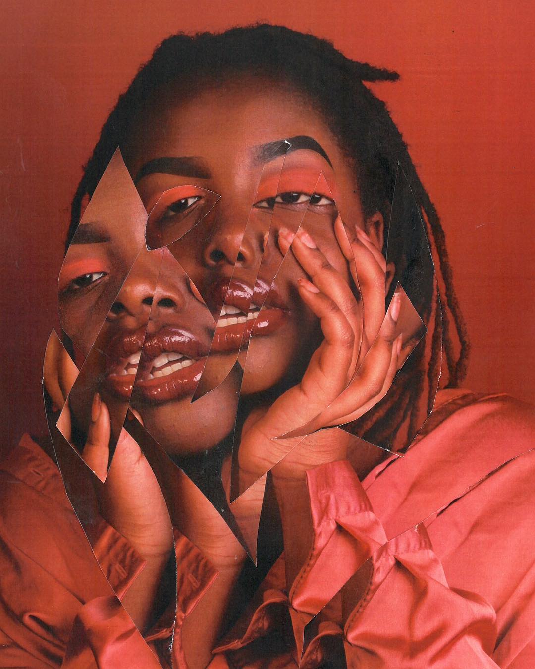 A woman's face is fragmented with glass pieces in a surreal collage against a warm red backdrop.