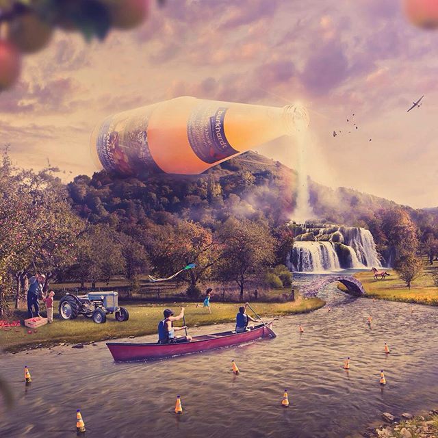 A surreal scene with a giant juice bottle pouring into a waterfall, with people canoeing on the river.