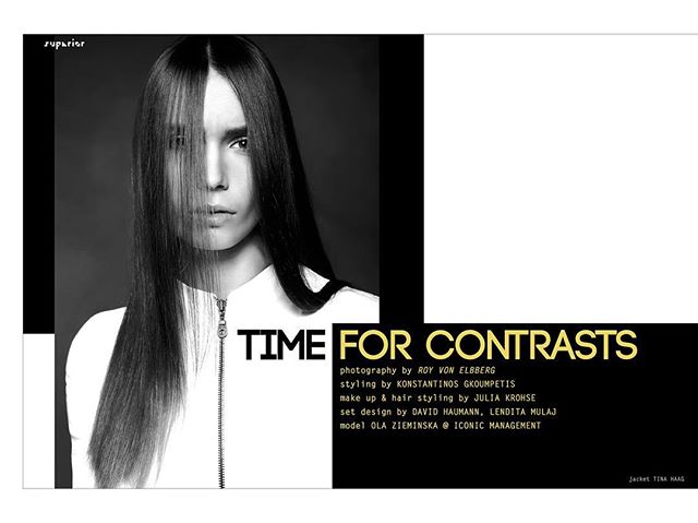 A striking black and white fashion editorial featuring a model with straight, sleek hair.