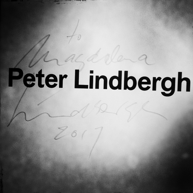 Close-up of Peter Lindbergh's signature and dedicatory note, showcasing his personal touch in a monochrome image.