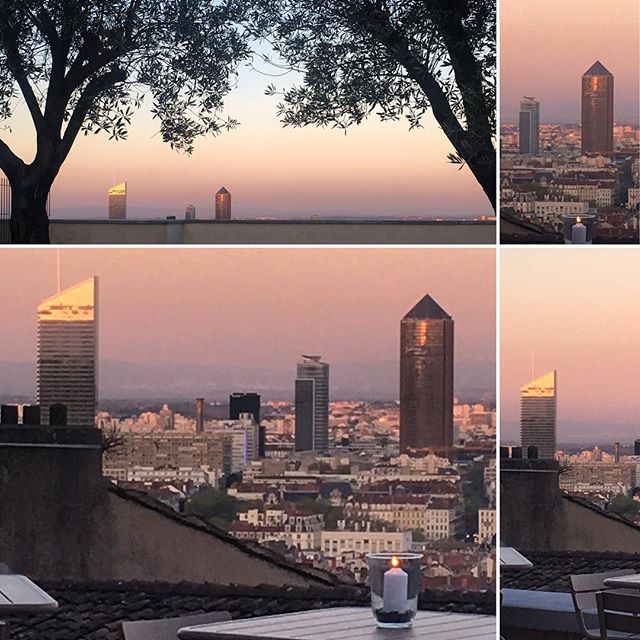 A scenic view of Lyon's skyline at sunset, featuring the iconic skyscrapers against a warm, tranquil sky.