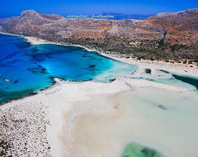 Aerial view of Balos Lagoon in Crete, Greece, featuring crystal clear water and sandy beaches.