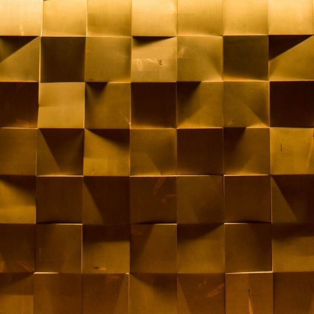 Abstract pattern of geometric squares creates a modern, textured background for various design projects.