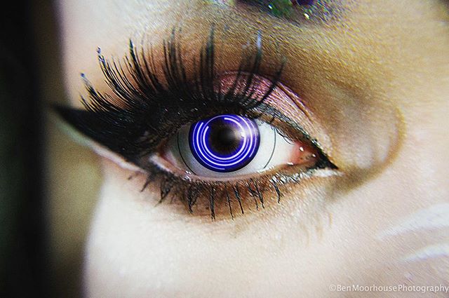 A close-up of an eye with enhanced iris and makeup, perfect for a beauty or fashion campaign.