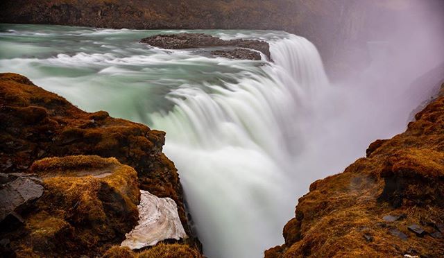 Scenic Gullfoss waterfall in Iceland showcases the raw power and beauty of nature. Ideal for travel and nature themes.