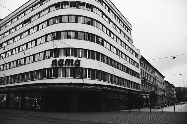 Black and white shot of the Nama store building on a city street.
