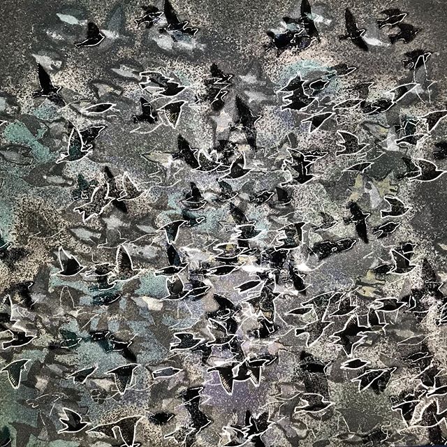 A flock of birds fly in an artistic, abstract style against a dark background.