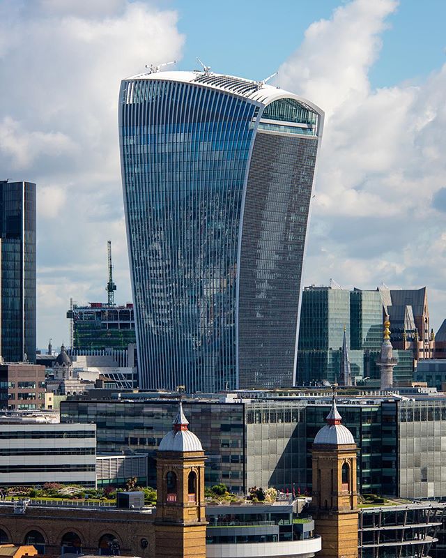 A view of the distinctive skyscraper in London's skyline, set against a cloudy sky.