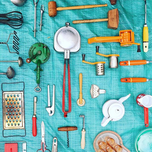 Overhead view of vintage kitchen utensils, capturing a nostalgic and classic feel for cooking and food preparation.