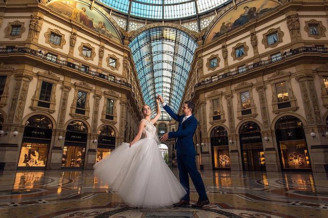 A bride and groom share a dance in Galleria Vittorio Emanuele II in Milan, Italy.