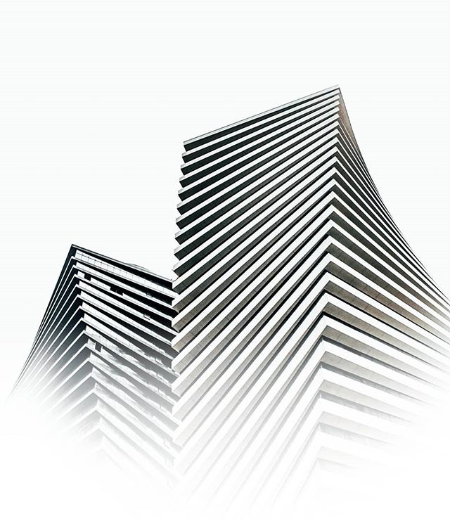 Abstract view of a modern building with geometric lines in monochrome, perfect for urban development or architectural design concepts.