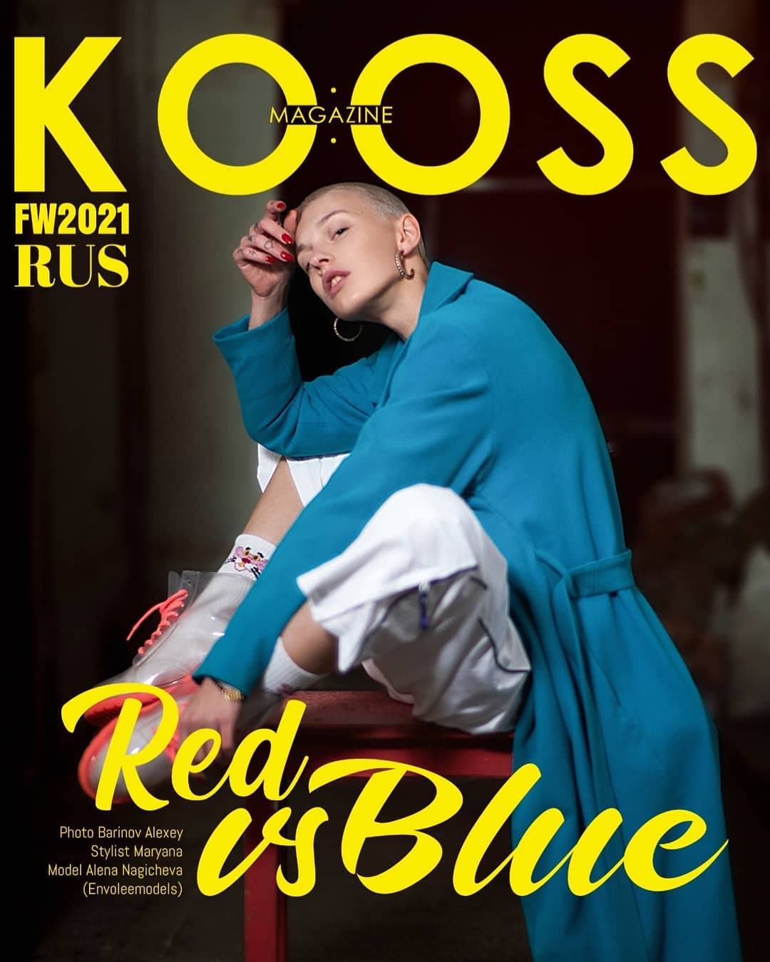 A model poses for a fashion magazine cover with bold yellow and blue text.