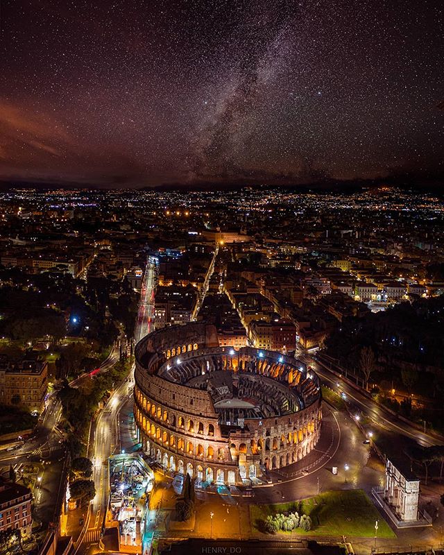 Night view of the illuminated Colosseum in Rome under the starry sky, showcasing the city's rich history and architectural beauty.